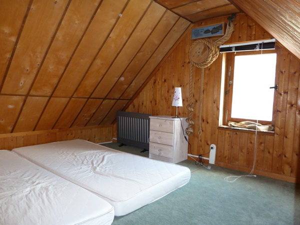 Das kleine obere Schlafzimmer mit Seeblick.
